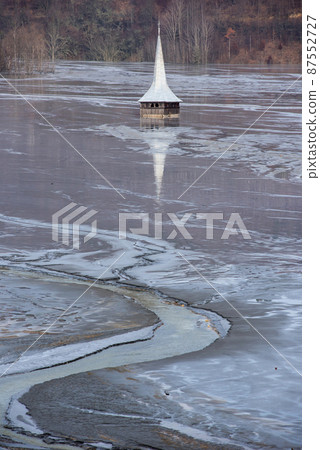 Church flooded and submerged by toxic waste waters from a copper and gold mine. Geamana, Rosia Montana, Romania 87552727