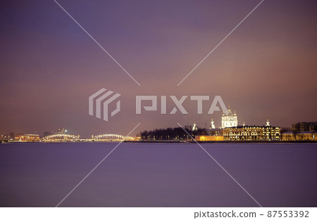 Smolny Cathedral, Smolny Embankment and Bolsheokhtinsky Bridge in the evening. St. Petersburg. Russia 87553392