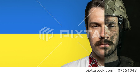 Courage. Half-faced portraits of serious man in military uniform and Ukrainian national clothes embroidered shirt called vyshyvanka Courage. Half-faced portraits of serious man in military uniform and Ukrainian national clothes embroidered shirt called vyshyvanka 87554048