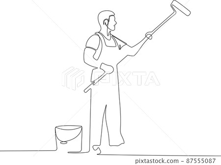 Human hand holds paint brushes with paint can Human hand holds paint brushes with paint can 87555087