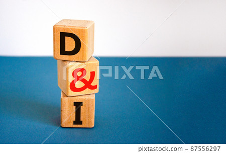 D and I, Diversity and inclusion symbol. Concept words D and I, diversity and inclusion on wooden cubes on beautiful blue table, white background. Business, D and I, diversity and inclusion concept. 87556297