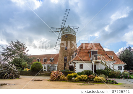 Stone windmill in Saint Peter, bailiwick of Jersey, Channel Islands, UK 87556741