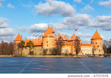 Trakai Island Castle orange walls and towers, lake Galve, Republic of Lithuania Trakai Island Castle orange walls and towers, lake Galve, Republic of Lithuania 87557076