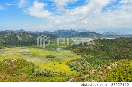 Panoramic view to Skadar lake valley and mountains, Montenegro 87557120