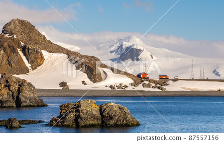 Antarctic landscape with mountains and argentinian Camara base station, Half Moon island, Antarctic peninsula Antarctic landscape with mountains and argentinian Camara base station, Half Moon island, Antarctic peninsula 87557156