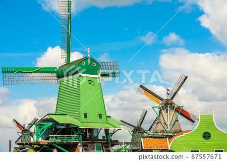 Colorful Dutch Windmills at the river Zaan, Zaanse Schans, Zaandam, The Netherlands Colorful Dutch Windmills at the river Zaan, Zaanse Schans, Zaandam, The Netherlands 87557671