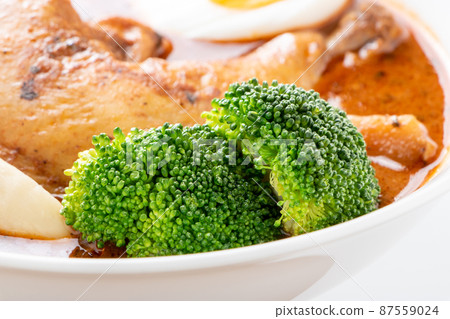 Broccoli up in soup curry. 87559024