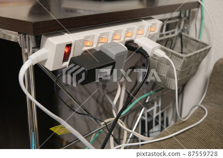 Outlet octopus foot wiring messed up cable stock photos Outlet octopus foot wiring messed up cable stock photos 87559728