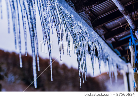 Icicles in early spring Icicles in early spring 87560654