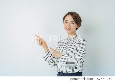 Female business pointing 87562430