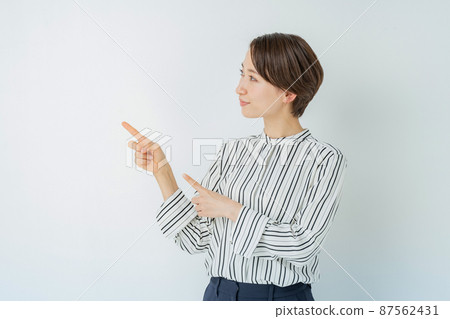 Female business pointing 87562431