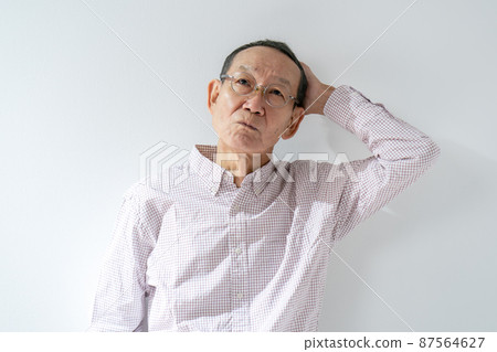 Senior man worries and thinks Senior man worries and thinks 87564627