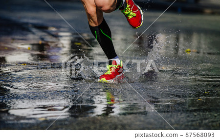 runner legs in compression socks run a puddle 87568093