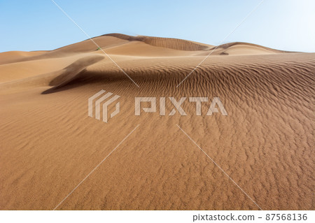 Erg Chebbi, sand desert of Merzouga, southeast of Morocco. Popular destination for travellers. 87568136