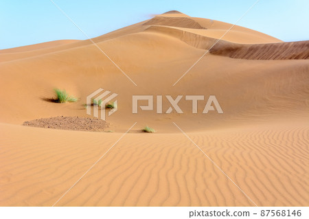 Erg Chebbi, sand desert of Merzouga, southeast of Morocco. Popular destination for travellers. Erg Chebbi, sand desert of Merzouga, southeast of Morocco. Popular destination for travellers. 87568146