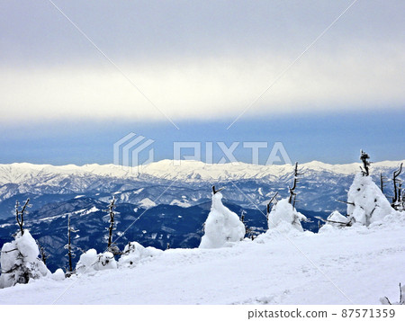 Yamagata Zao Asahi mountain range towering over the rime field of Mt. Zao Yamagata Zao Asahi mountain range towering over the rime field of Mt. Zao 87571359