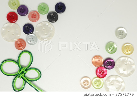 Background using handicraft buttons and Mizuhiki work Background using handicraft buttons and Mizuhiki work 87571779