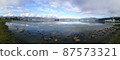 Panorama view of the Lake Suwa in the Kiso Mountains, Nagano, Japan. 87573321