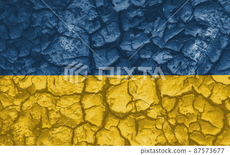 Ukrainian national flag pattern cracked earth, war concept Ukrainian national flag pattern cracked earth, war concept 87573677