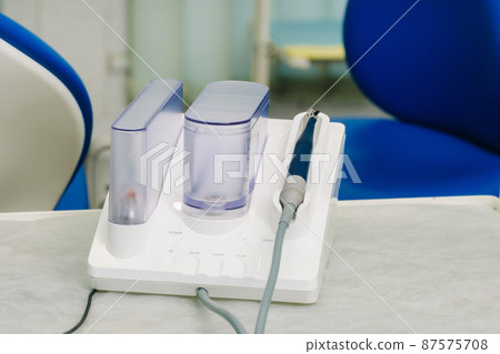 Ultrasonic scaler in the dental office. Dentistry Concept Ultrasonic scaler in the dental office. Dentistry Concept 87575708