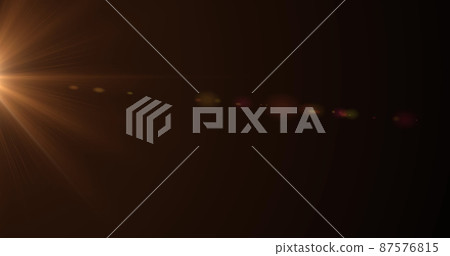 Image of orange glowing light on brown background Image of orange glowing light on brown background 87576815