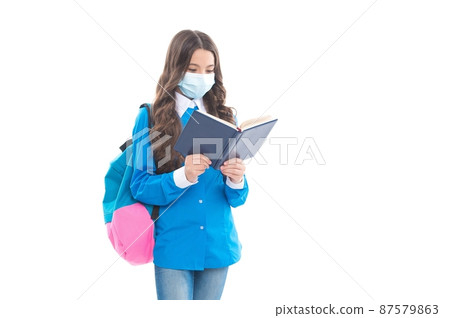 Little child read school book wearing face mask to prevent COVID-19 disease transmission, knowledge Little child read school book wearing face mask to prevent COVID-19 disease transmission, knowledge 87579863