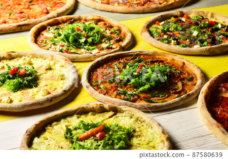 Different pizza set for menu. Pizza with meat, green onions Different pizza set for menu. Pizza with meat, green onions 87580639