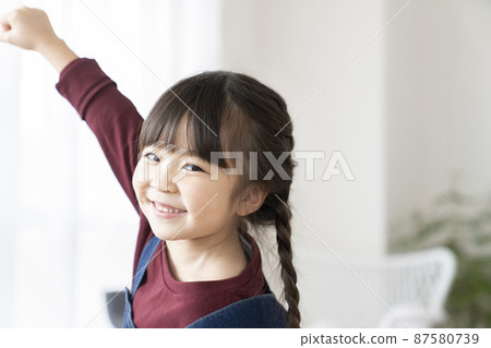 6-year old girl with a smile 6-year old girl with a smile 87580739