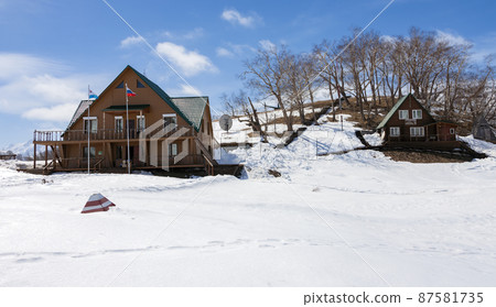 View of the buildings of the visitor center and the premises for researchers and the protection of the Valley of Geysers in Kamchatka. View of the buildings of the visitor center and the premises for researchers and the protection of the Valley of Geysers in Kamchatka. 87581735