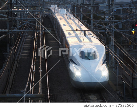 Shinkansen N700S J25 formation at the Honmachi overpass in the evening 87582506