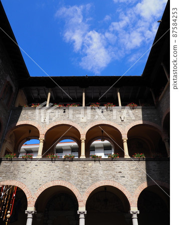 Arcades of city hall in Bellinzona city, Switzerland - vertical Arcades of city hall in Bellinzona city, Switzerland - vertical 87584253
