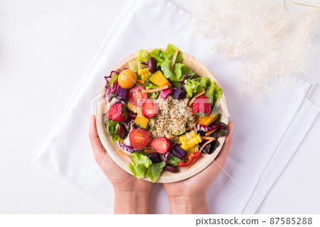 Fresh mixed fruits and vegetables salad, Healthy vegan food 87585288