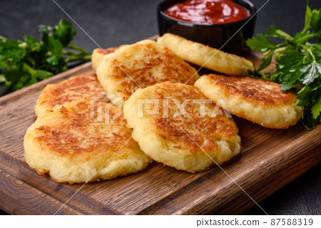 Potato Cakes. Vegetable fritters, latkes, hash browns. Vegetable pancakes Potato Cakes. Vegetable fritters, latkes, hash browns. Vegetable pancakes 87588319