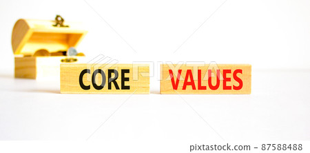 Core values symbol. Concept words Core values on wooden blocks on a beautiful white table white background. Wooden chest with coins. Business value and core values concept, copy space. Core values symbol. Concept words Core values on wooden blocks on a beautiful white table white background. Wooden chest with coins. Business value and core values concept, copy space. 87588488