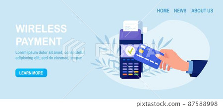Contactless payment. Human hand holding credit or debit card close to the POS terminal to pay. Transaction by NFC technology. 87588998