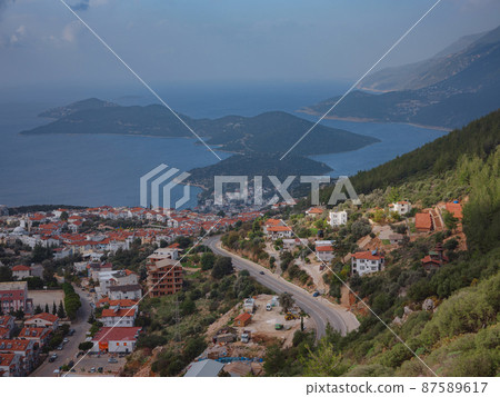 Harbour of city Kas or Kash in Turkey and Greek island Kastelorizo 87589617