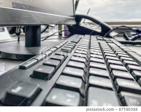 computer keyboard with black release keys. Office equipment. workplace at a desktop computer. keyboard for typing, programming computer keyboard with black release keys. Office equipment. workplace at a desktop computer. keyboard for typing, programming 87590388
