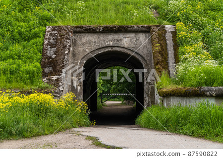 Russia. Kronstadt. June 5, 2020. Prokhonaya arch in the defensive fortifications of Fort SHANETS. Russia. Kronstadt. June 5, 2020. Prokhonaya arch in the defensive fortifications of Fort SHANETS. 87590822