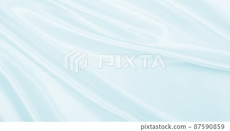Smooth elegant blue silk or satin luxury cloth texture as abstract background. Luxurious background design 87590859