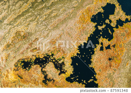 Miory District, Vitebsk Region, Belarus. The Yelnya Swamp. Upland And Transitional Bogs With Numerous Lakes. Elevated Aerial View Of Yelnya Nature Reserve Landscape. Famous Natural Landmark Miory District, Vitebsk Region, Belarus. The Yelnya Swamp. Upland And Transitional Bogs With Numerous Lakes. Elevated Aerial View Of Yelnya Nature Reserve Landscape. Famous Natural Landmark 87591348