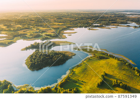 Braslaw Or Braslau, Vitebsk Voblast, Belarus. Aerial View Of Nedrava Lake. Landscape In Sunny Morning. Top View Of Beautiful European Nature From High Attitude. Bird's Eye View. Famous Lakes. Natural Braslaw Or Braslau, Vitebsk Voblast, Belarus. Aerial View Of Nedrava Lake. Landscape In Sunny Morning. Top View Of Beautiful European Nature From High Attitude. Bird's Eye View. Famous Lakes. Natural 87591349