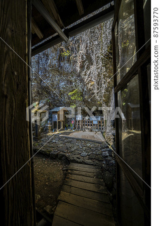 Behind the main hall of Nichiryubuji Temple, the burial place for the bones of Minamoto no Yoritomo Behind the main hall of Nichiryubuji Temple, the burial place for the bones of Minamoto no Yoritomo 87593770