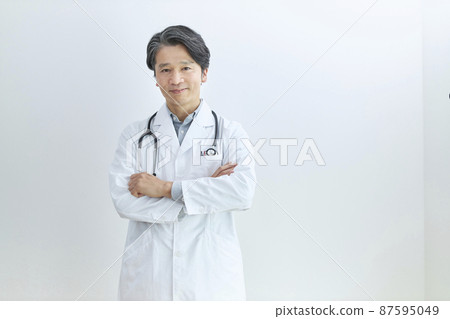 White coat doctor portrait 87595049