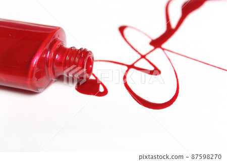 Spilled Red Nail Polish on White Background 87598270