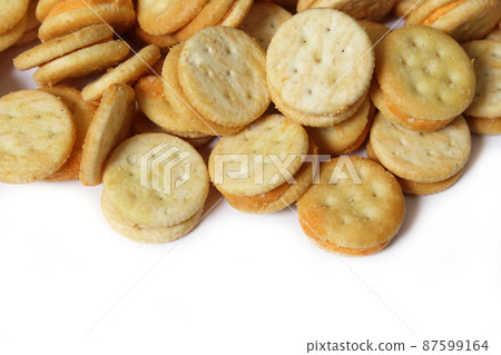 Pile of Cheese Snack Crackers Close up Pile of Cheese Snack Crackers Close up 87599164