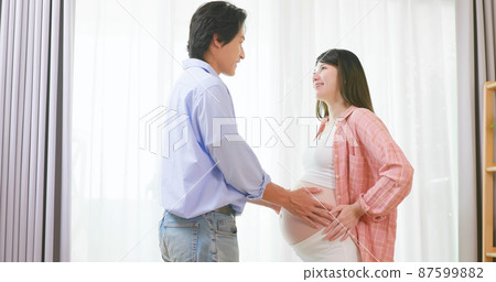 asian pregnant couple feel love asian pregnant couple feel love 87599882