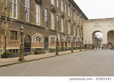 Copenhagen, Denmark - Nov 26, 2019 : View of courtyard at Christiansborg Palace in winter in Copenhagen, Denmark. on Nov 26, 2019. Copenhagen, Denmark - Nov 26, 2019 : View of courtyard at Christiansborg Palace in winter in Copenhagen, Denmark. on Nov 26, 2019. 87602443