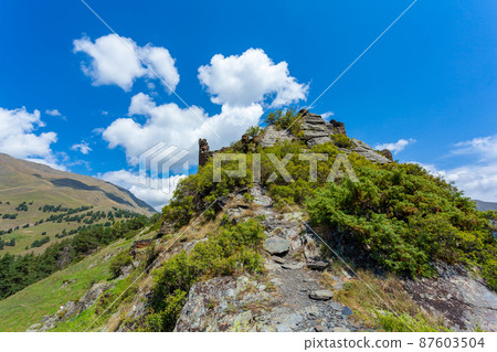 uins of an old stone fortress. Old Diklo, Tusheti, Georgia uins of an old stone fortress. Old Diklo, Tusheti, Georgia 87603504