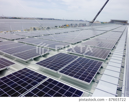 Solar panels on the roof of the factory 87603722