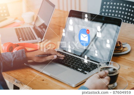 Email marketing concept, Businesswoman receiving new incoming message at work, e-mail communication marketing, business newsletter.. 87604959